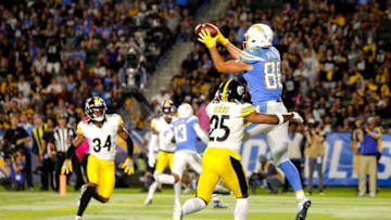 CARSON, CALIFORNIA - OCTOBER 13: Tight end Hunter Henry #86 of the Los Angeles Chargers makes the catch for a touchdown as cornerback Joe Haden #23 of the Pittsburgh Steelers defends during the fourth quarter at Dignity Health Sports Park on October 13, 2019 in Carson, California. (Photo by Katharine Lotze/Getty Images)
