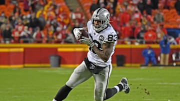 KANSAS CITY, MO - DECEMBER 01: Tight end Darren Waller #83 of the Oakland Raiders runs up field after catching a pass against the Kansas City Chiefs during the second half at Arrowhead Stadium on December 1, 2019 in Kansas City, Missouri. (Photo by Peter Aiken/Getty Images)