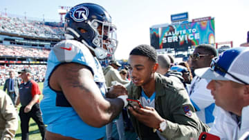 NASHVILLE, TENNESSEE - NOVEMBER 10: Jeffery Simmons #98 of the Tennessee Titans shakes hands with a fan prior to a game against the Kansas City Chiefs at Nissan Stadium on November 10, 2019 in Nashville, Tennessee. (Photo by Frederick Breedon/Getty Images)