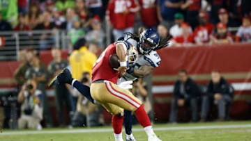 SANTA CLARA, CA - NOVEMBER 11: Jadeveon Clowney #90 of the Seattle Seahawks sacks Jimmy Garoppolo #10 of the San Francisco 49ers during the game at Levi's Stadium on November 11, 2019 in Santa Clara, California. The Seahawks defeated the 49ers 27-24. (Photo by Michael Zagaris/San Francisco 49ers/Getty Images)