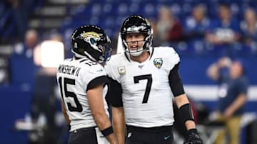 INDIANAPOLIS, INDIANA - NOVEMBER 17: Nick Foles #7 of the Jacksonville Jaguars speaks with Gardner Minshew II #15 prior to a game against the Indianapolis Colts at Lucas Oil Stadium on November 17, 2019 in Indianapolis, Indiana. (Photo by Stacy Revere/Getty Images)