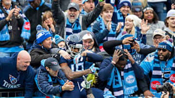 NASHVILLE, TN - DECEMBER 22: Tajae Sharpe #19 of the Tennessee Titans Saints celebrates with fans after scoring a touchdown in the second half of a game against the New Orleans Saints at Nissan Stadium on December 22, 2019 in Nashville, Tennessee. The Saints defeated the Titans 38-28. (Photo by Wesley Hitt/Getty Images)