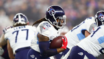 FOXBOROUGH, MASSACHUSETTS - JANUARY 04: Derrick Henry #22 of the Tennessee Titans carries the ball against the New England Patriots in the first half of the AFC Wild Card Playoff game at Gillette Stadium on January 04, 2020 in Foxborough, Massachusetts. (Photo by Adam Glanzman/Getty Images)