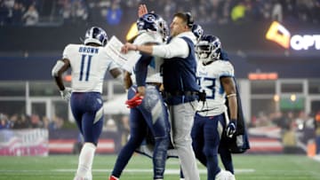 FOXBOROUGH, MASSACHUSETTS - JANUARY 04: Derrick Henry #22 of the Tennessee Titans celebrates his touchdown with head coach Mike Vrabel against the New England Patriots in the second quarter of the AFC Wild Card Playoff game at Gillette Stadium on January 04, 2020 in Foxborough, Massachusetts. (Photo by Kathryn Riley/Getty Images)