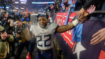 FOXBOROUGH, MASSACHUSETTS - JANUARY 04: Derrick Henry #22 of the Tennessee Titans celebrates with fans after their 20-13 win over the Tennessee Titans in the AFC Wild Card Playoff game at Gillette Stadium on January 04, 2020 in Foxborough, Massachusetts. (Photo by Kathryn Riley/Getty Images)