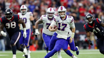 HOUSTON, TEXAS - JANUARY 04: Josh Allen #17 of the Buffalo Bills scrambles in the first half of the AFC Wild Card Playoff game against the Houston Texans at NRG Stadium on January 04, 2020 in Houston, Texas. (Photo by Tim Warner/Getty Images)