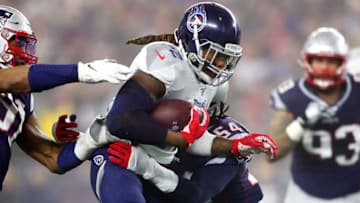 FOXBOROUGH, MASSACHUSETTS - JANUARY 04: Derrick Henry #22 of the Tennessee Titans carries the ball in the AFC Wild Card Playoff game against the New England Patriots at Gillette Stadium on January 04, 2020 in Foxborough, Massachusetts. (Photo by Adam Glanzman/Getty Images)