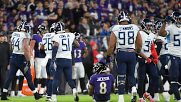 BALTIMORE, MARYLAND - JANUARY 11: Quarterback Lamar Jackson #8 of the Baltimore Ravens sits on the field after a play against the Tennessee Titans during the AFC Divisional Playoff game at M&T Bank Stadium on January 11, 2020 in Baltimore, Maryland. (Photo by Will Newton/Getty Images)