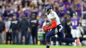 BALTIMORE, MARYLAND - JANUARY 11: Kevin Byard #31 of the Tennessee Titans runs after intercepting a pass during the first quarter against the Baltimore Ravens in the AFC Divisional Playoff game at M&T Bank Stadium on January 11, 2020 in Baltimore, Maryland. (Photo by Rob Carr/Getty Images)