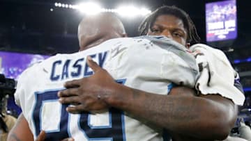 BALTIMORE, MARYLAND - JANUARY 11: Quarterback Lamar Jackson #8 of the Baltimore Ravens and Jurrell Casey #99 of the Tennessee Titans embrace after the Titans win the AFC Divisional Playoff game 28-12 at M&T Bank Stadium on January 11, 2020 in Baltimore, Maryland. (Photo by Todd Olszewski/Getty Images)