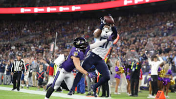 BALTIMORE, MARYLAND - JANUARY 11: L.J. Fort #58 of the Baltimore Ravens defends a pass intended for Jonnu Smith #81 of the Tennessee Titans during the second half in the AFC Divisional Playoff game at M&T Bank Stadium on January 11, 2020 in Baltimore, Maryland. (Photo by Rob Carr/Getty Images)