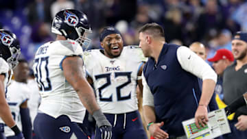 BALTIMORE, MARYLAND - JANUARY 11: Head coach Mike Vrabel talks with Derrick Henry #22 of the Tennessee Titans during the closing moments of AFC Divisional Playoff game against the Baltimore Ravens at M&T Bank Stadium on January 11, 2020 in Baltimore, Maryland. (Photo by Rob Carr/Getty Images)