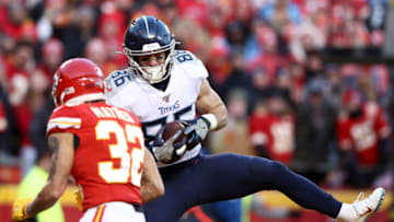 KANSAS CITY, MISSOURI - JANUARY 19: Anthony Firkser #86 of the Tennessee Titans catches a 22 yard touchdown pass in the fourth quarter against Tyrann Mathieu #32 of the Kansas City Chiefs in the AFC Championship Game at Arrowhead Stadium on January 19, 2020 in Kansas City, Missouri. (Photo by Jamie Squire/Getty Images)