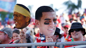 TAMPA, FL - DECEMBER 28: Tampa Bay Buccaneers fans display photos of Oregon quarterback Marcus Mariota and Florida State quarterback Jameis Winston late in the game against the New Orleans Saints at Raymond James Stadium on December 28, 2014 in Tampa, Florida. The Saints defeated the Bucs 23-20. (Photo by Joe Robbins/Getty Images)