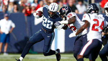 NASHVILLE, TN - DECEMBER 03: Derrick Henry #22 of the Tennessee Titans pushes off a tackle from Benardrick McKinney #55 of the Houston Texans during the first half at Nissan Stadium on December 3, 2017 in Nashville, Tennessee. (Photo by Wesley Hitt/Getty Images)