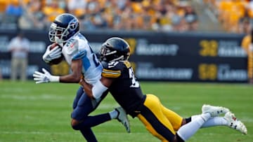 PITTSBURGH, PA - AUGUST 25: Nat Berhe #31 of the Pittsburgh Steelers tackles Deontay Burnett #80 of the Tennessee Titans during a preseason game on August 25, 2018 at Heinz Field in Pittsburgh, Pennsylvania. (Photo by Justin K. Aller/Getty Images)