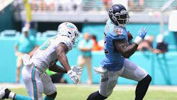 MIAMI, FL - SEPTEMBER 09: Tight End Delanie Walker #82 of the Tennessee Titans runs after the catch against Jerome Baker #55 of the Miami Dolphins at Hard Rock Stadium on September 9, 2018 in Miami, Florida. (Photo by Marc Serota/Getty Images)