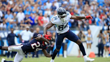 NASHVILLE, TN - SEPTEMBER 16: Corey Davis #84 of the Tennessee Titans is tackled by Johnathan Joseph #24 of the Houston Texans during the fourth quarter at Nissan Stadium on September 16, 2018 in Nashville, Tennessee. (Photo by Andy Lyons/Getty Images)