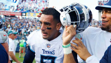 NASHVILLE, TN - SEPTEMBER 30: Marcus Mariota #8 of the Tennessee Titans is congratulated as he removes his helmet after defeating the Philadelphia Eagles 26-23 in overtime at Nissan Stadium on September 30, 2018 in Nashville, Tennessee. (Photo by Wesley Hitt/Getty Images)