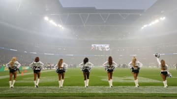 LONDON, ENGLAND - OCTOBER 14: The Oakland Raiders Cheerleaders ' the Raiderettes' look on ahead of the NFL International series match between Seattle Seahawks and Oakland Raiders at Wembley Stadium on October 14, 2018 in London, England. (Photo by Naomi Baker/Getty Images)