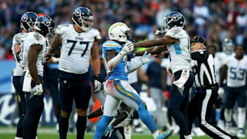 LONDON, ENGLAND - OCTOBER 21: Desmond King #20 of the Los Angeles Chargers and Tajae Sharpe #19 of the Tennessee Titans push and shove during the NFL International Series game between Tennessee Titans and Los Angeles Chargers at Wembley Stadium on October 21, 2018 in London, England. (Photo by Jack Thomas/Getty Images)