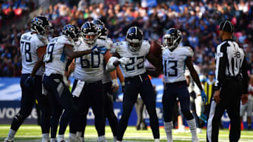 LONDON, ENGLAND - OCTOBER 21: Derrick Henry (22) of the Tennessee Titans celebrates with team mates after scoring a touchdown during the Tennessee Titans against the Los Angeles Chargers at Wembley Stadium on October 21, 2018 in London, England. (Photo by Justin Setterfield/Getty Images)