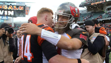 CINCINNATI, OH - OCTOBER 28: Andy Dalton #14 of the Cincinnati Bengals and Ryan Fitzpatrick #14 of the Tampa Bay Buccaneers congratulate each other at the end of the game at Paul Brown Stadium on October 28, 2018 in Cincinnati, Ohio. Cincinnati defeated Tampa Bay 37-34. (Photo by John Grieshop/Getty Images)