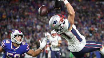BUFFALO, NY - OCTOBER 29: Rob Gronkowski #12 of the New England Patriots cannot catch a pass during NFL game action as Matt Milano #58 of the Buffalo Bills defends at New Era Field on October 29, 2018 in Buffalo, New York. (Photo by Tom Szczerbowski/Getty Images)