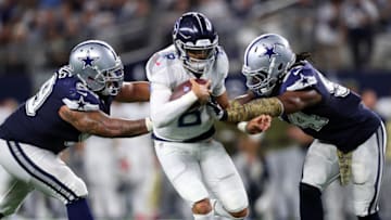ARLINGTON, TX - NOVEMBER 05: Antwaun Woods #99 of the Dallas Cowboys and Jaylon Smith #54 of the Dallas Cowboys are unable to stop the touchdown run in the fourth quarter of a football game at AT&T Stadium on November 5, 2018 in Arlington, Texas. (Photo by Tom Pennington/Getty Images)