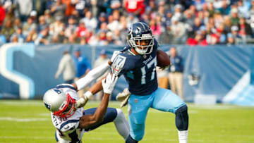 NASHVILLE, TN - NOVEMBER 11: Cameron Batson #17 of the Tennessee Titans runs with the ball while defended by Jason McCourty #30 of the New England Patriots during the first quarter at Nissan Stadium on November 11, 2018 in Nashville, Tennessee. (Photo by Frederick Breedon/Getty Images)