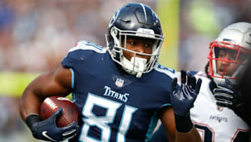 NASHVILLE, TN - NOVEMBER 11: Jonnu Smith #81 of the Tennessee Titans runs with the ball while defended by Stephon Gilmore #24 of the New England Patriots during the first quarter at Nissan Stadium on November 11, 2018 in Nashville, Tennessee. (Photo by Wesley Hitt/Getty Images)