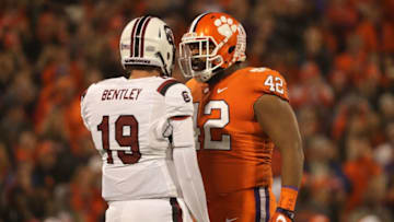 CLEMSON, SC - NOVEMBER 24: Christian Wilkins #42 of the Clemson Tigers reacts in the face of Jake Bentley #19 of the South Carolina Gamecocks during their game at Clemson Memorial Stadium on November 24, 2018 in Clemson, South Carolina. (Photo by Streeter Lecka/Getty Images)