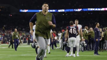 HOUSTON, TX - NOVEMBER 26: Head coach Mike Vrabel of the Tennessee Titans jogs off the field after the game against the Houston Texans at NRG Stadium on November 26, 2018 in Houston, Texas. (Photo by Tim Warner/Getty Images)