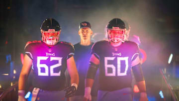 NASHVILLE, TN - DECEMBER 2: Ben Jones #60 of the Tennessee Titans and Corey Levin #62 walk out of the tunnel before playing the New York Jets at Nissan Stadium on December 2, 2018 in Nashville, Tennessee. (Photo by Wesley Hitt/Getty Images)