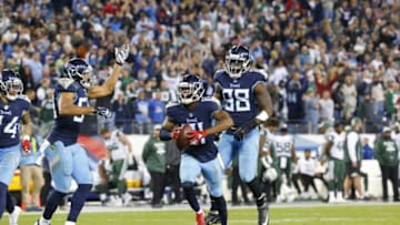 NASHVILLE, TN - DECEMBER 2: Malcolm Butler #21 of the Tennessee Titans celebrates with Brian Orakpo #98 during the fourth quarter against the New York Jets at Nissan Stadium on December 2, 2018 in Nashville, Tennessee. (Photo by Frederick Breedon/Getty Images)