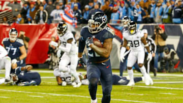 NASHVILLE, TN - DECEMBER 6: Derrick Henry #22 of the Tennessee Titans runs downfield with the ball for a 99 yard touchdown against the Jacksonville Jaguars at Nissan Stadium on December 6, 2018 in Nashville, Tennessee. (Photo by Frederick Breedon/Getty Images)