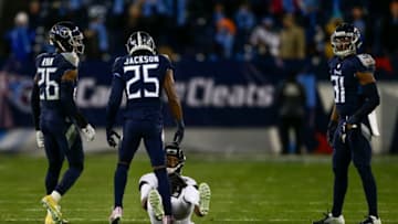 NASHVILLE, TN - DECEMBER 6: Adoree' Jackson #25 of the Tennessee Titans stands over Donte Moncrief #10 of the Jacksonville Jaguars after tackling him during the fourth quarter at Nissan Stadium on December 6, 2018 in Nashville, Tennessee. (Photo by Silas Walker/Getty Images)