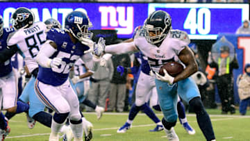 EAST RUTHERFORD, NJ - DECEMBER 16: Derrick Henry #22 of the Tennessee Titans runs against Alec Ogletree #52 of the New York Giants during the first half at MetLife Stadium on December 16, 2018 in East Rutherford, New Jersey. (Photo by Steven Ryan/Getty Images)