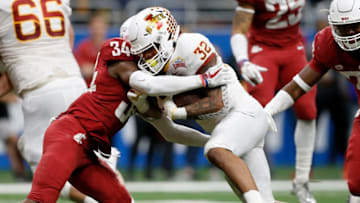 SAN ANTONIO, TX - DECEMBER 28: David Montgomery #32 of the Iowa State Cyclones breaks a tackle by Jalen Thompson #34 of the Washington State Cougars for a touchdown in the third quarter during the Valero Alamo Bowl at the Alamodome on December 28, 2018 in San Antonio, Texas. (Photo by Tim Warner/Getty Images)