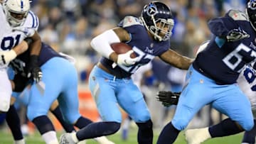NASHVILLE, TN - DECEMBER 30: Derrick Henry #22 of the Tennessee Titans runs with the ball against the Indianapolis Colts at Nissan Stadium on December 30, 2018 in Nashville, Tennessee. (Photo by Andy Lyons/Getty Images)