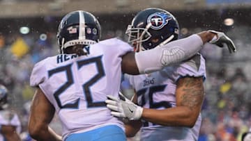 EAST RUTHERFORD, NEW JERSEY - DECEMBER 16: Derrick Henry #22 and Adoree' Jackson #25 of the Tennessee Titans react after Henry scored a touchdown during the third quarter of the game against the New York Giants at MetLife Stadium on December 16, 2018 in East Rutherford, New Jersey. (Photo by Sarah Stier/Getty Images)