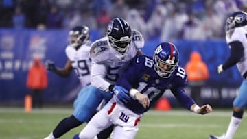 EAST RUTHERFORD, NEW JERSEY - DECEMBER 16: Rashaan Evans #54 of the Tennessee Titans takes down Eli Manning #10 of the New York Giants during their game at MetLife Stadium on December 16, 2018 in East Rutherford, New Jersey. (Photo by Al Bello/Getty Images)