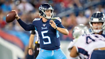 NASHVILLE, TN - AUGUST 17: Logan Woodside #5 of the Tennessee Titans throws a pass during week two of the preseason at Nissan Stadium on August 17, 2019 in Nashville, Tennessee. The Patriots defeated the Titans 22-17. (Photo by Wesley Hitt/Getty Images)