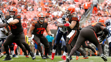 CLEVELAND, OH - SEPTEMBER 8: Baker Mayfield #6 of the Cleveland Browns gets hit by Cameron Wake #91 of the Tennessee Titans as he throws a pass during the fourth quarter at FirstEnergy Stadium on September 8, 2019 in Cleveland, Ohio. Tennessee defeated Cleveland 43-13. (Photo by Kirk Irwin/Getty Images)
