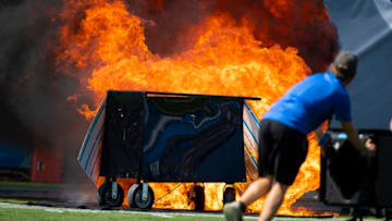 NASHVILLE, TN - SEPTEMBER 15: A failed pyrotechnic device bursts into flames before the game between the Tennessee Titans and the Indianapolis Colts at Nissan Stadium on September 15, 2019 in Nashville, Tennessee. (Photo by Brett Carlsen/Getty Images)