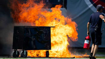 NASHVILLE, TN - SEPTEMBER 15: A failed pyrotechnic device bursts into flames before the game between the Tennessee Titans and the Indianapolis Colts at Nissan Stadium on September 15, 2019 in Nashville, Tennessee. (Photo by Brett Carlsen/Getty Images)