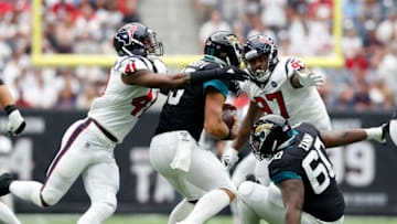 HOUSTON, TX - SEPTEMBER 15: Zach Cunningham #41 of the Houston Texans sacks Gardner Minshew #15 of the Jacksonville Jaguars in the first quarter at NRG Stadium on September 15, 2019 in Houston, Texas. (Photo by Tim Warner/Getty Images)