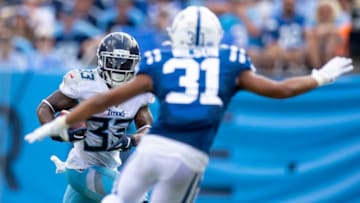 NASHVILLE, TN - SEPTEMBER 15: Dion Lewis #33 of the Tennessee Titans runs with the ball against Quincy Wilson #31 of the Indianapolis Colts during the second quarter at Nissan Stadium on September 15, 2019 in Nashville, Tennessee. (Photo by Brett Carlsen/Getty Images)
