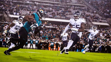 JACKSONVILLE, FLORIDA - SEPTEMBER 19: Jacksonville Jaguars wide receiver Dede Westbrook 12 faces off with Tennessee Titans linebacker Jayon Brown 55 in the second half at TIAA Bank Field on September 19, 2019 in Jacksonville, Florida. (Photo by Harry Aaron/Getty Images)