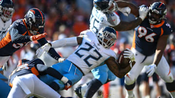DENVER, CO - OCTOBER 13: Derrick Henry #22 of the Tennessee Titans is tackled by Von Miller #58 of the Denver Broncos in the second quarter of a game at Empower Field at Mile High on October 13, 2019 in Denver, Colorado. (Photo by Dustin Bradford/Getty Images)